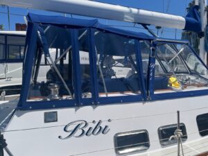 A boat with the name bibi on it.